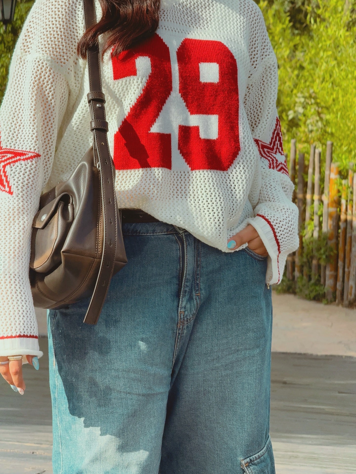 Areeka Haq Striped Oversized Knit Jersey Sweater